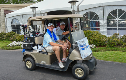 Golfers Wave from Golf Cart (2018)